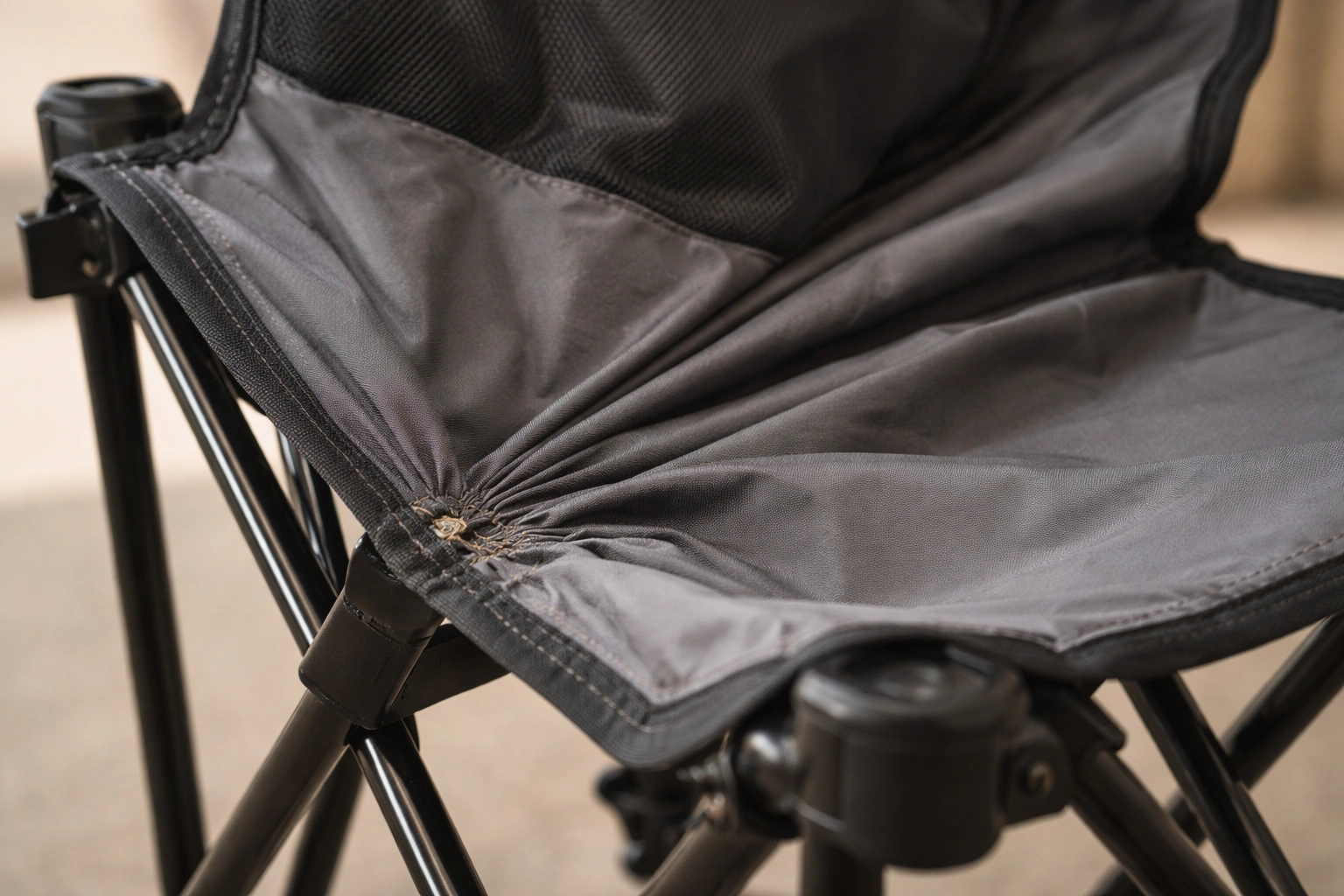 Camping chair seat fabric bunching and wrinkling due to incorrect folding technique