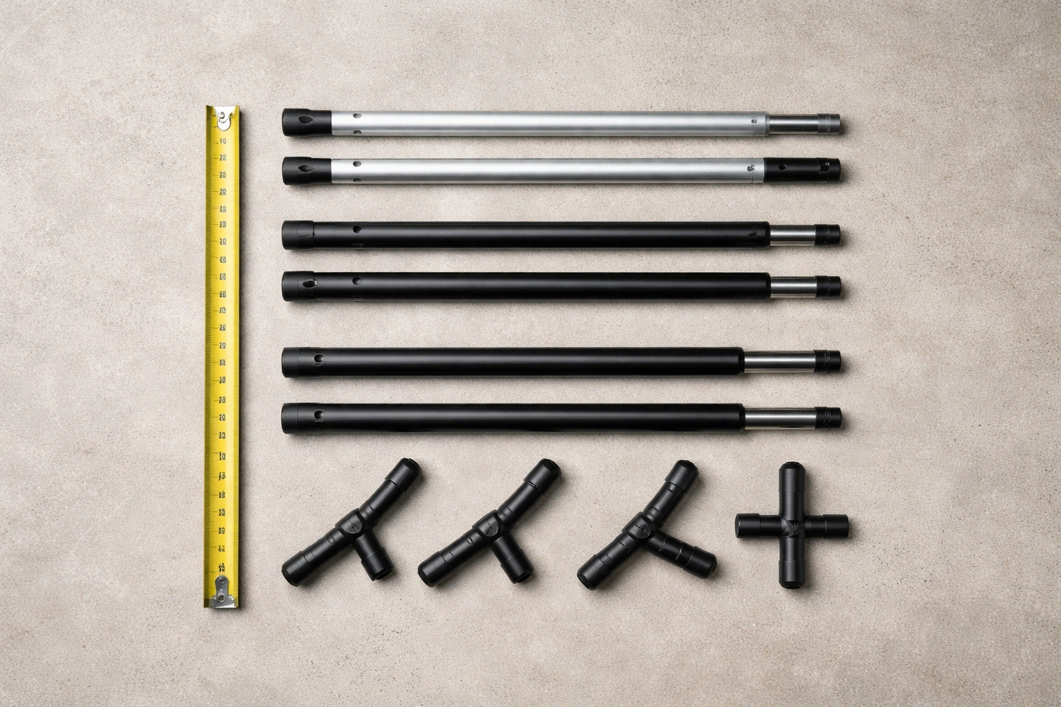 Aluminum and steel chair leg tubes arranged for measurement and replacement